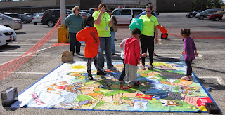 Youth using the Risk game board