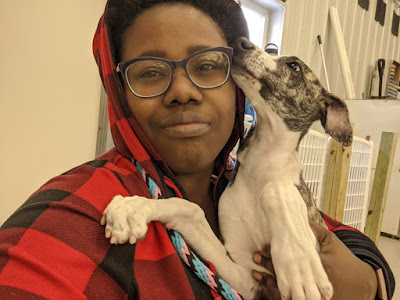 Oluademi James-Daniel, co-founder of the Inclusivity dog training group, with her dog