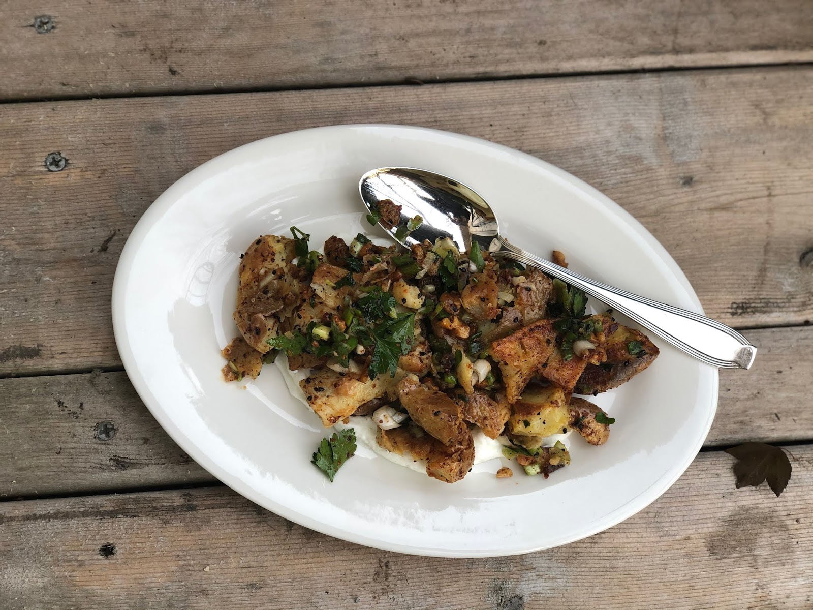 Crispy Smashed Potatoes with Pickles and Gin-Spiked Sour Cream