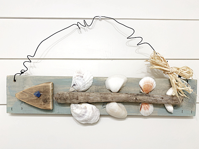 fish bone art with driftwood and shells