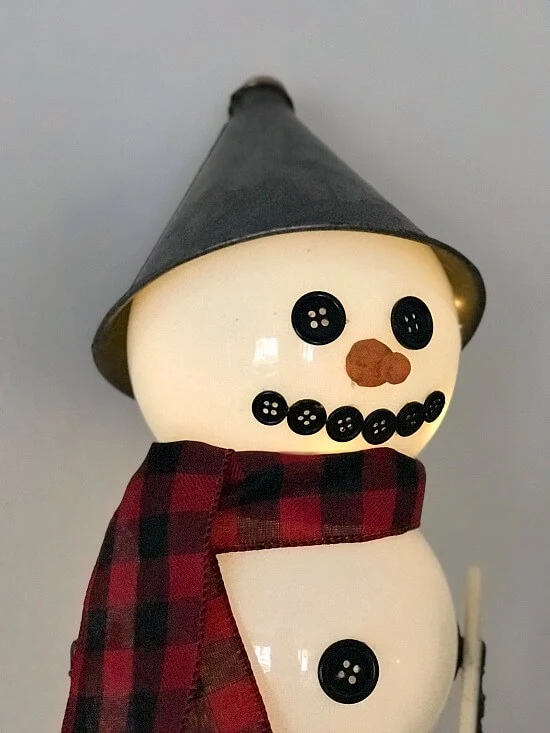 Light up snowman using repurposed and found parts