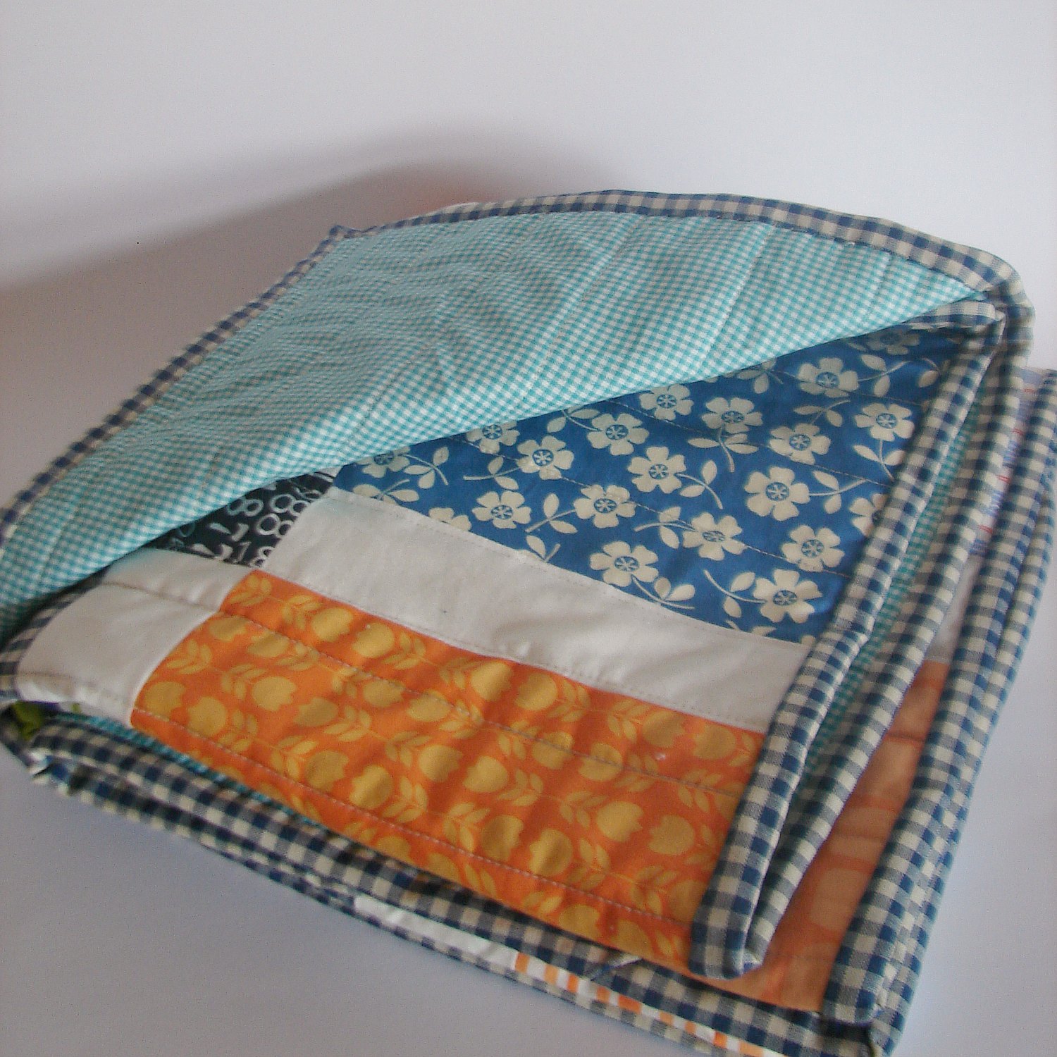 Roxy Creations Sweet blue and orange cot quilt