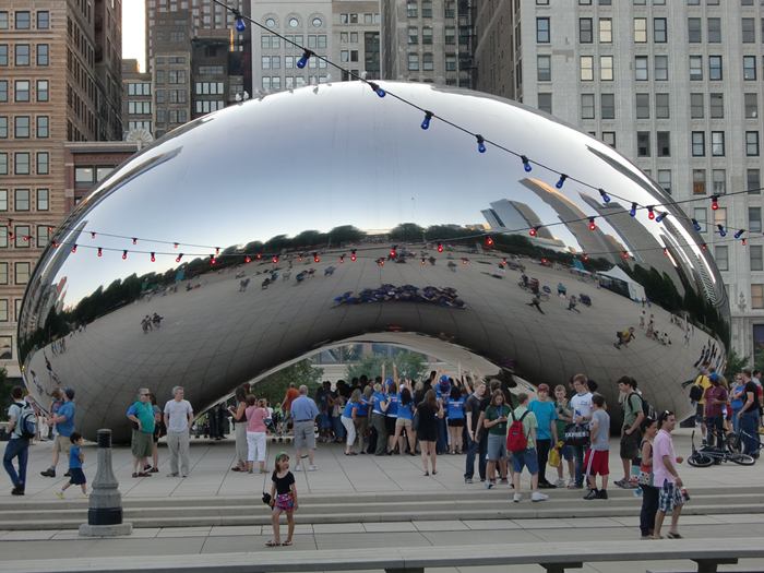 Cloud Gate, a public sculpture is the centerpiece of the AT&T Plaza in Millennium Park within the Loop community area of Chicago, Illinois, United States. The sculpture is nicknamed "The Bean" because of its bean-like shape. Made up of 168 stainless steel plates welded together, its highly polished exterior has no visible seams. 