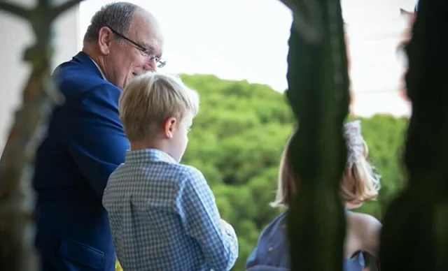 Princess Gabriella wore a newstripe-print tiered dress from Il Gufo.  Prince Albert and Hereditary Prince Jacques.