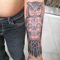 Tatuajes de buhos y calaveras 