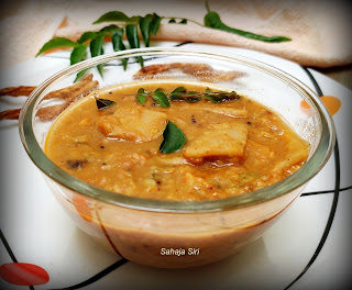 Wheat flour dumplings in sambhar