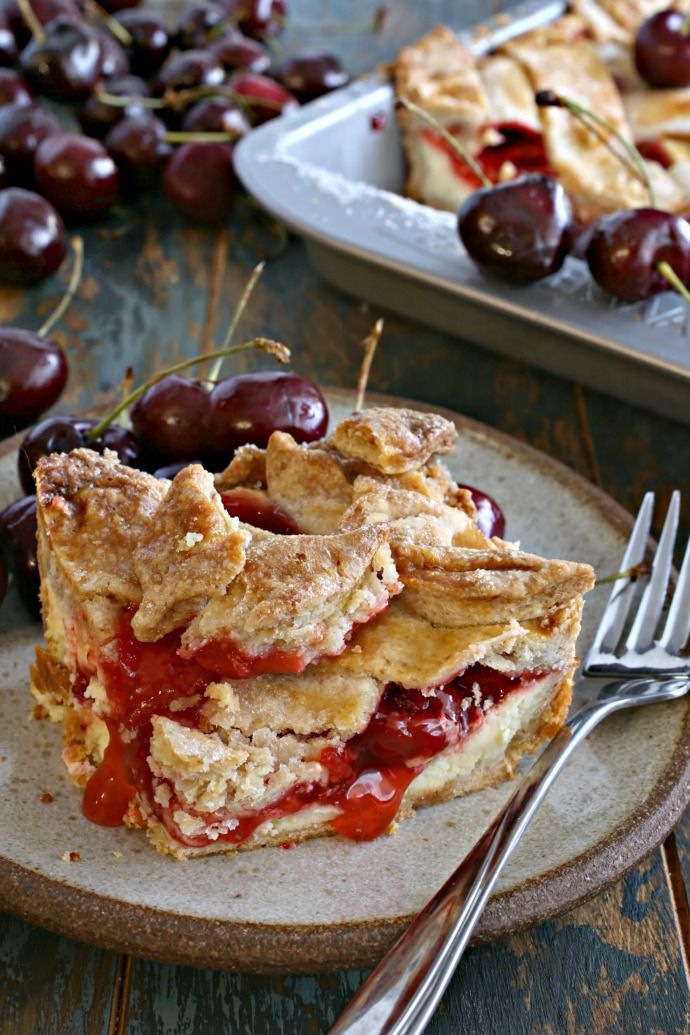 Recipe for pie with an almond cookie crust and cherry cheesecake filling.