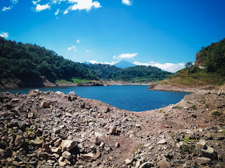 Natural Environment Ground Rock Fragments And Lake Water Of Titab Ularan Dam Between The Hills North Bali Indonesia