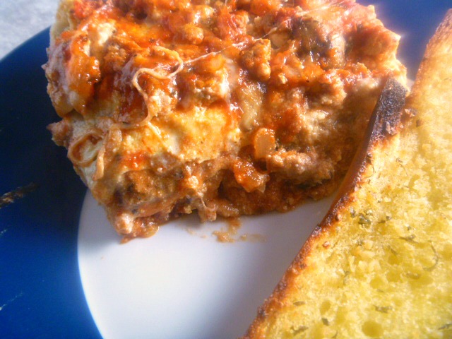 Essential Lasagna: Nothing spells comfort more than layers of steaming tender pasta filled with gooey meat and cheese, topped with a robust sauce that is bursting with flavor.  - Slice of Southern