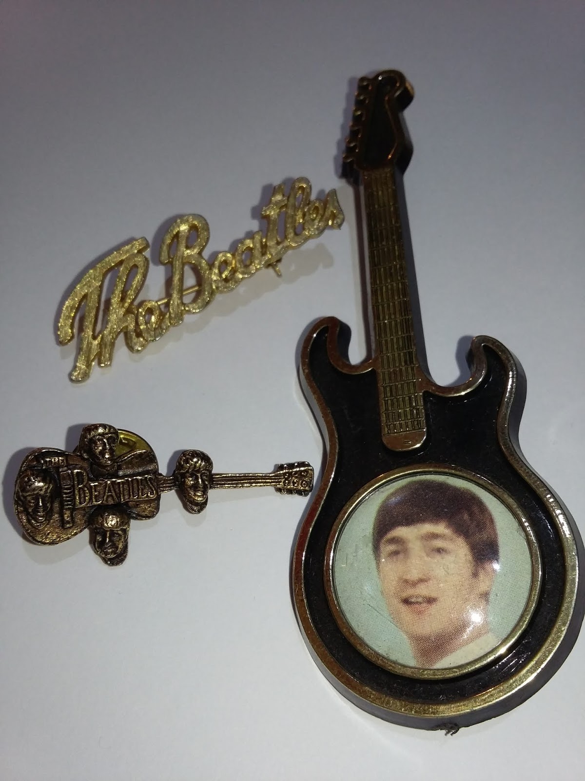 Liverpool Beatles Auction Rattle Your Jewellery A Beatles Pendant