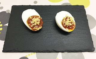 Spicy tuna stuffed eggs