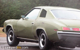 Leaning, gunning and sliding sideways in a 1973 Pontiac.