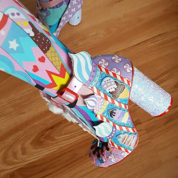 close up of sugar sweet candy themed shoes with matching tights