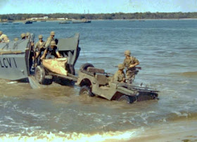 Landing Craft unloading a Jeep during World War II worldwartwofilminspector.com