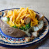 Guinness-braised Brats and Broccoli-topped Baked Potatoes