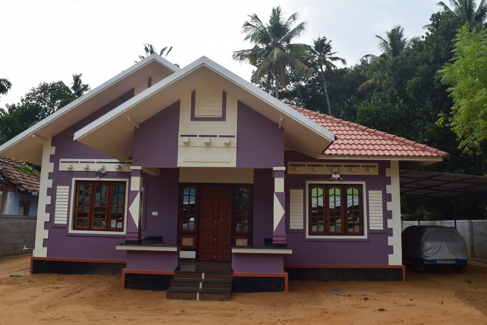 Low cost  House  Design  at Trivandram BUILDING DESIGNERS 