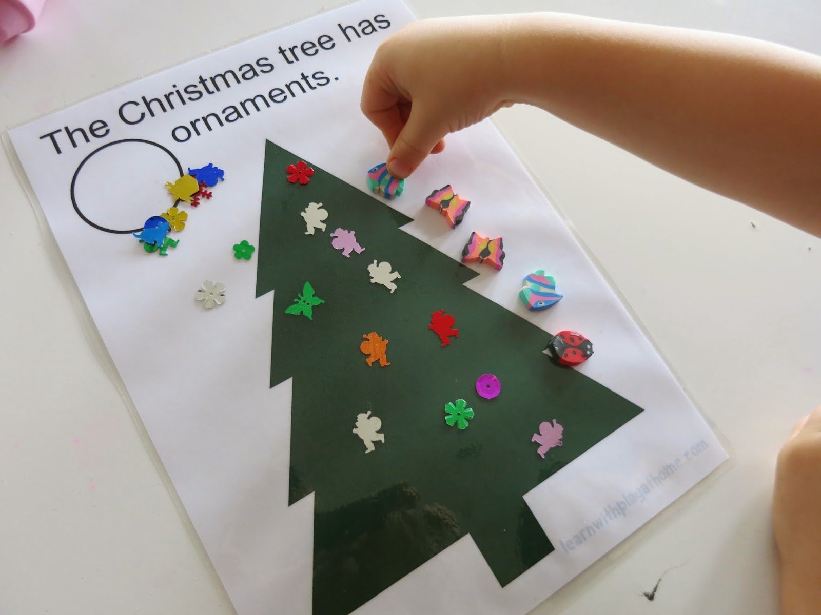 Learn with Play at Home Christmas Tree Play Mat. Free Printable