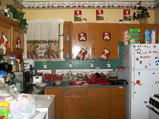 Kitchen Theme Ideas Chef Using Souvenirs As Kitchen Wall Decor