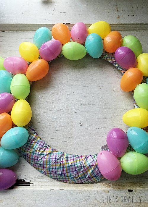Pastel Easter Egg Wreath DIY - use glue gun to glue plastic eggs to wreath form