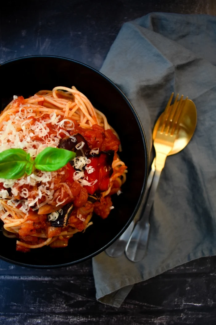 Homemade tomato and roasted red pepper sauce on spaghetti
