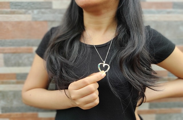 Lux wearing black dress_oNecklace jewelry
