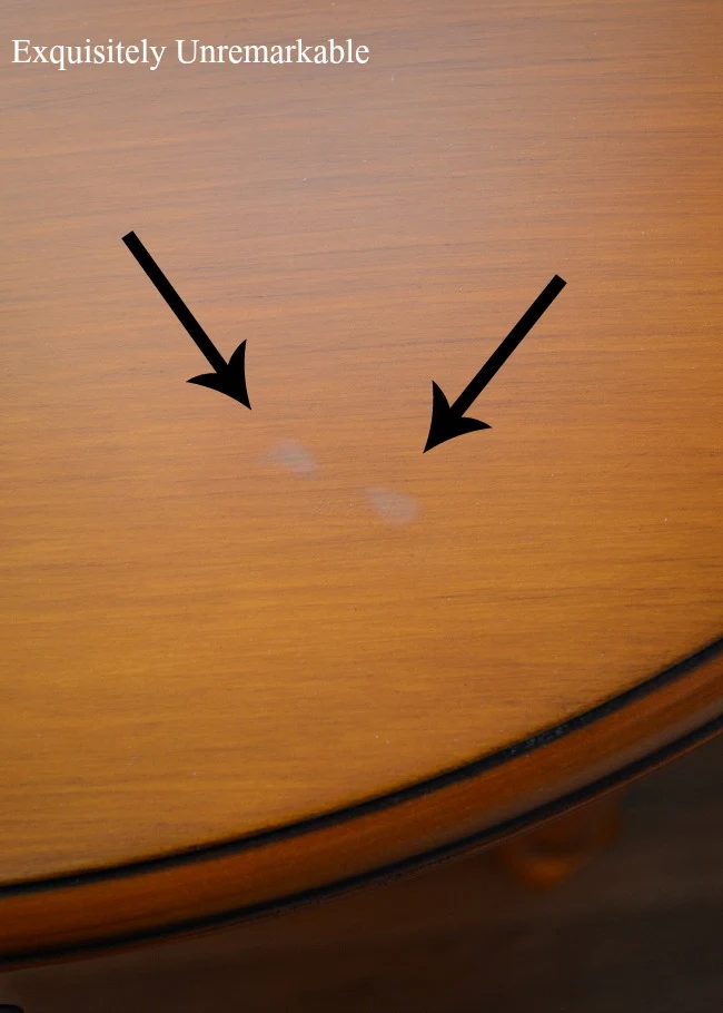 Water stains on round wood table