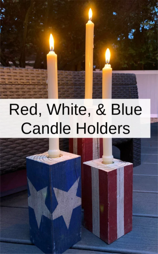 Candle holders with white lit candles