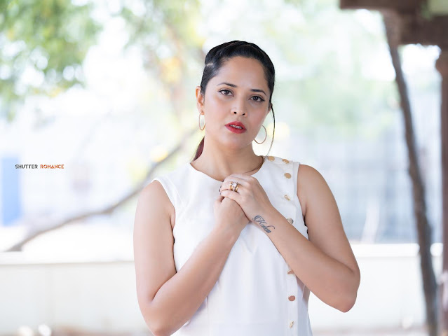 Anasuya Bharadwaj Latest Photoshoot in Sexy White Dress Navel Queens