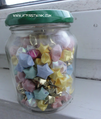 Folded stars in a glass jar