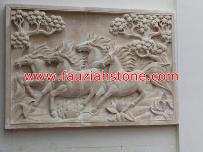 relief batu alam motif kuda