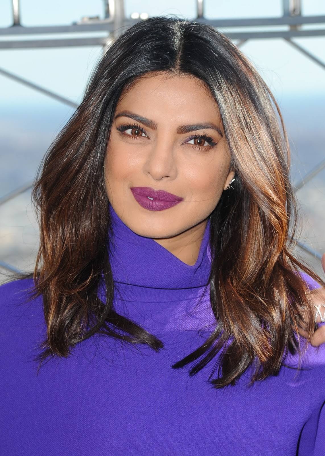 Priyanka Chopra Looks Sexy In a Purple Short Dress and Black Thigh High Boots During â€œQuanticoâ€ Promotion at The Empire State Building in New York City