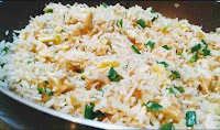 Cooked chicken fried rice in a non stick skillet