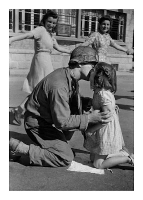 US soldier kissing young girls after liberation of France by Tony Vaccaro