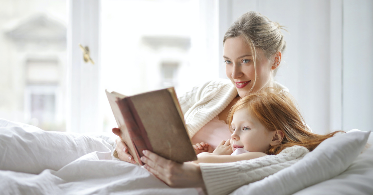 mother and child reading together