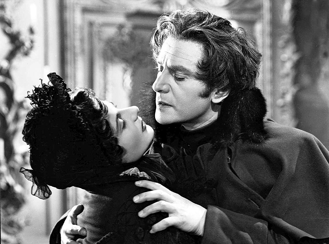 Yvonne Mitchell and Anton Walbrook embrace in The Queen of Spades 