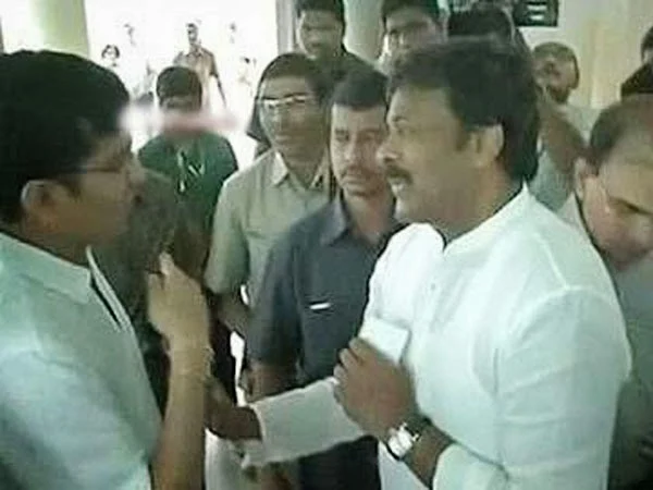 Actor Chiranjeevi tries to jump queue at polling booth, voter forces him back, 