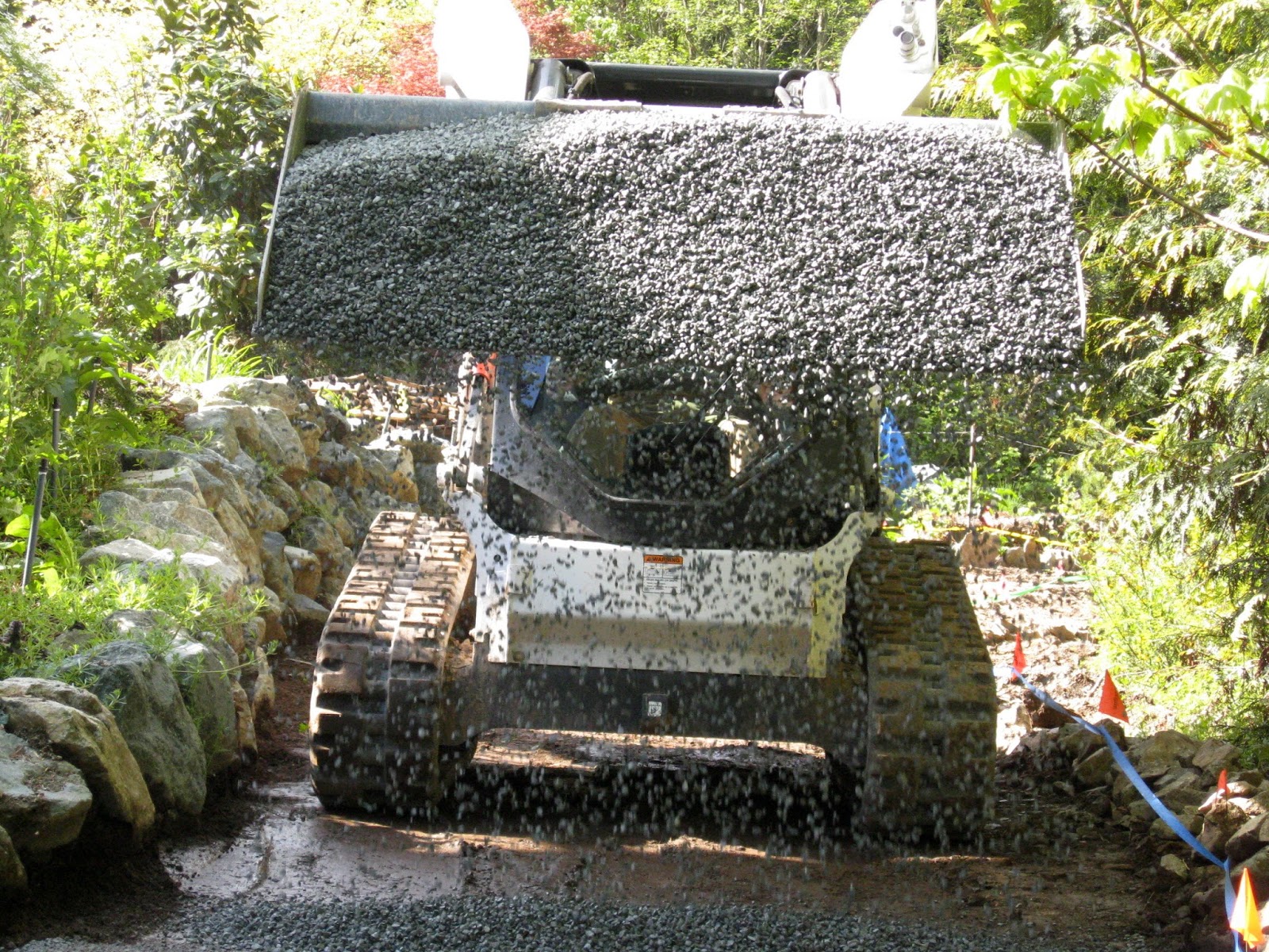 Lesley Turner Backyard Project Gravel Spreading, Rock Placing, Roof