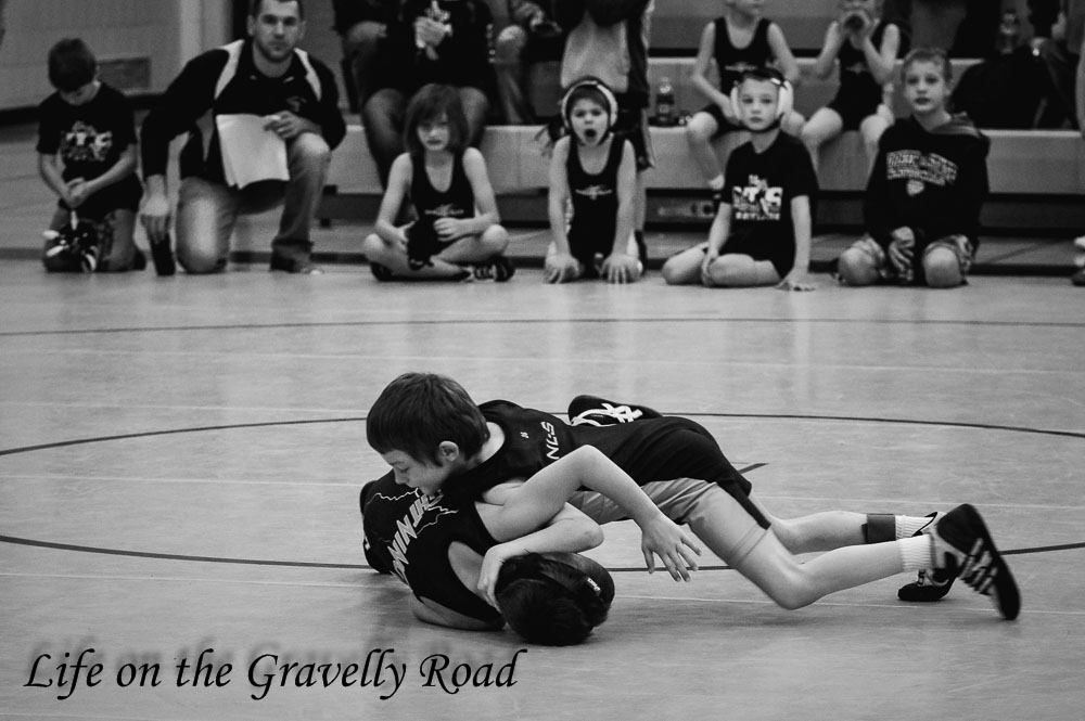 Life on the Gravelly Road Team Wrestling Together
