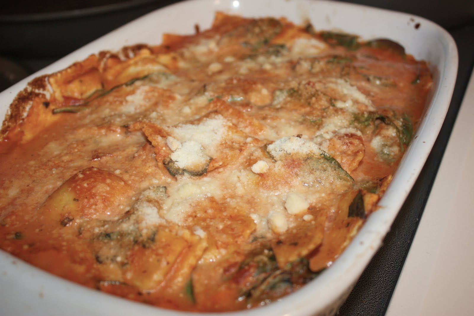 cooking with crystal: creamy tomato baked ravioli & spinach