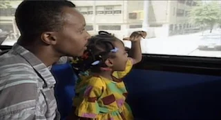 A girl narrates a film of herself taking the bus home with her dad. Sesame Street Elmo's Travel Songs and Games