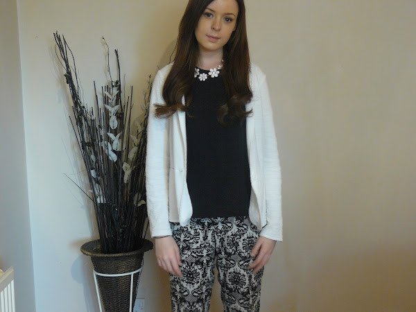 Monochrome printed trousers outfit.