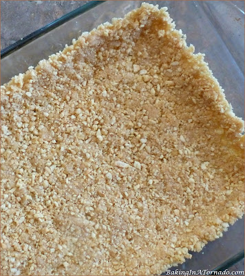 Lemon Fluff Refrigerator Bars (with a lower fat option) are a sweet, citrusy summer dessert. | Recipe developed by www.BakingInATornado.com | #recipe #dessert