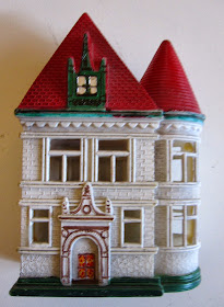 Plastic dolls' house for a dolls' house,