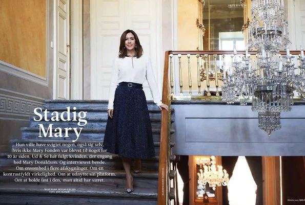 Crown Princess Mary gave an interview for Ud & Se magazine. Princess Mary wore skirt, Prada bag, Jesper Høvring dress