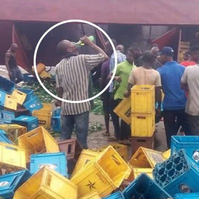 beer akwa crates ibom passersby rush got crashes lorry away cart loaded blocked crashed abak expressway bridge truck before