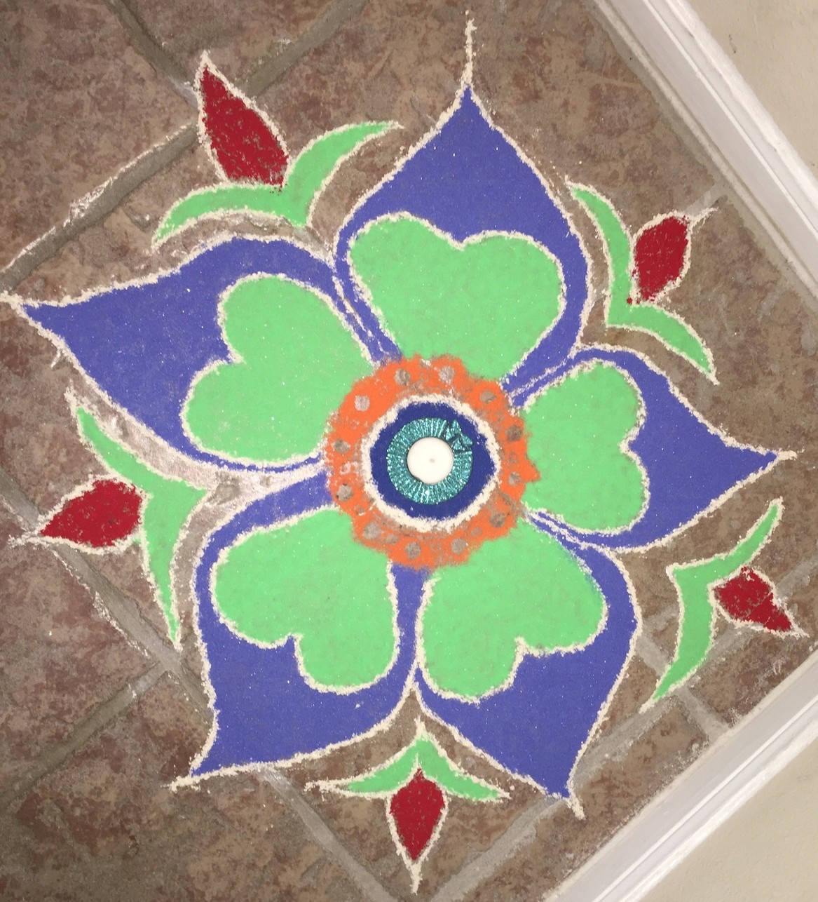 Ishika Art Gallery Rangoli using sand