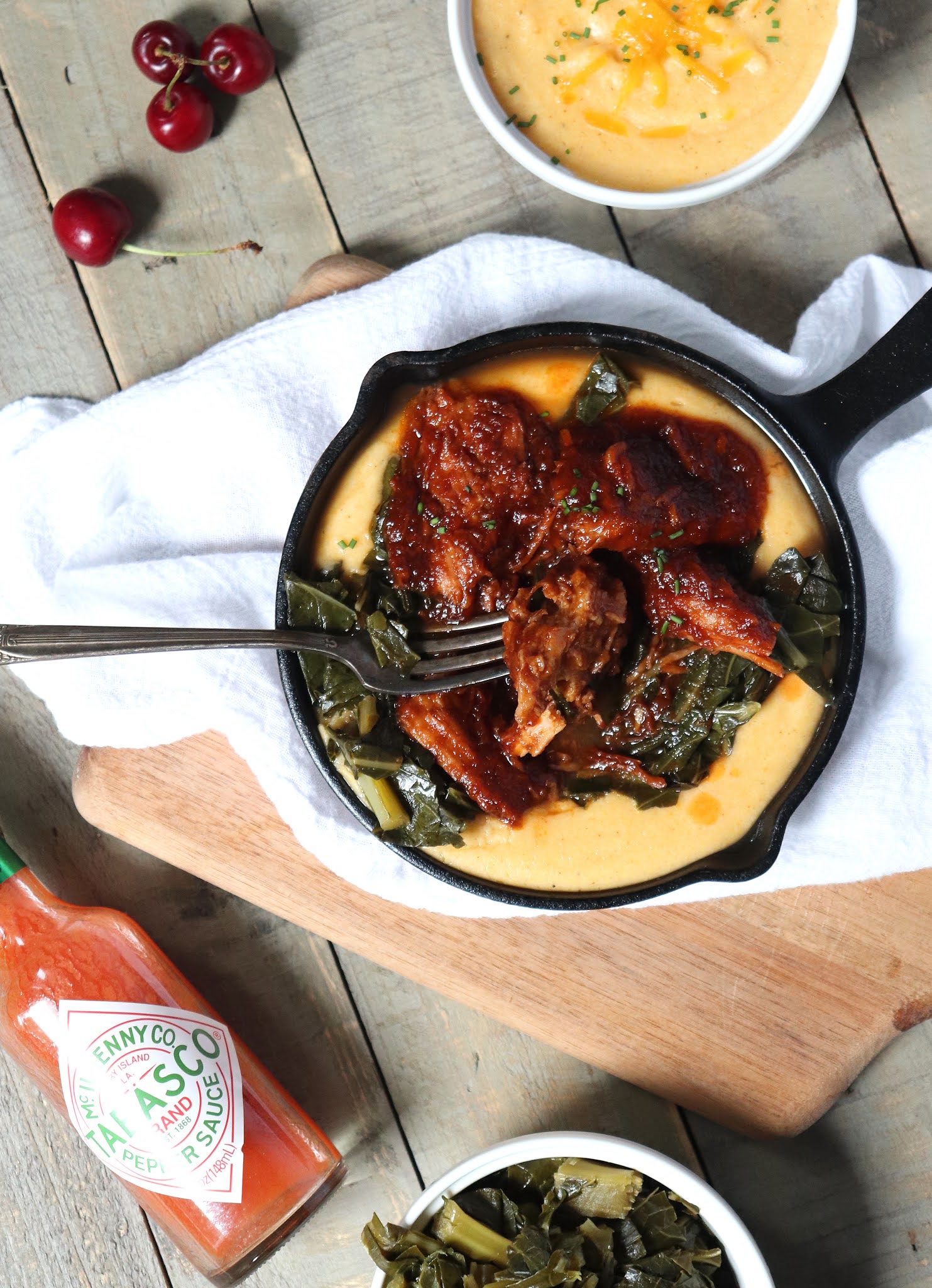 Annie à la Mode Cherry BBQ Pork w/ Cheesy Grits & Greens