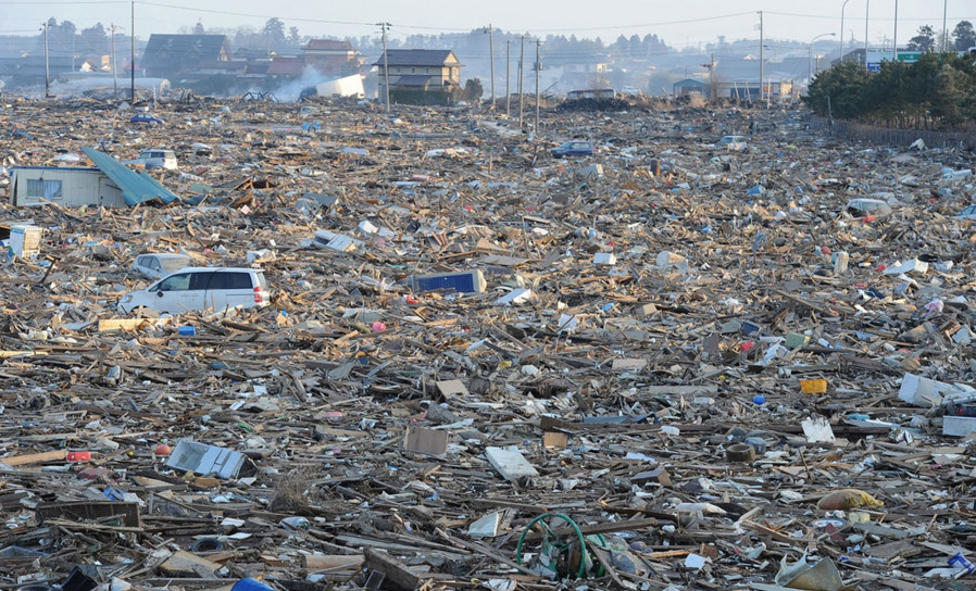 Tsunami debris covers a large area of Natori near Sendai in Miyagi Tsunami debris covers a large area of Natori near Sendai in Miyagi