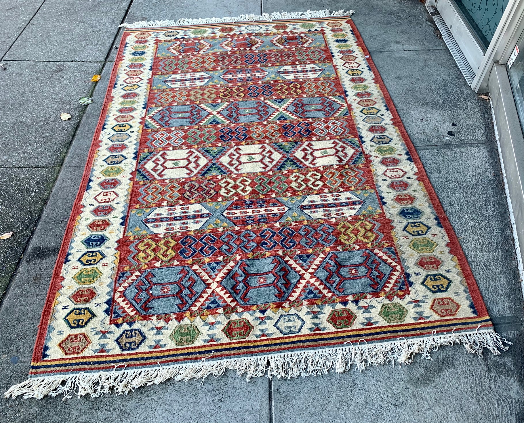 UHURU FURNITURE & COLLECTIBLES SOLD 102971 Hand Woven Wool Rug 8’1” x