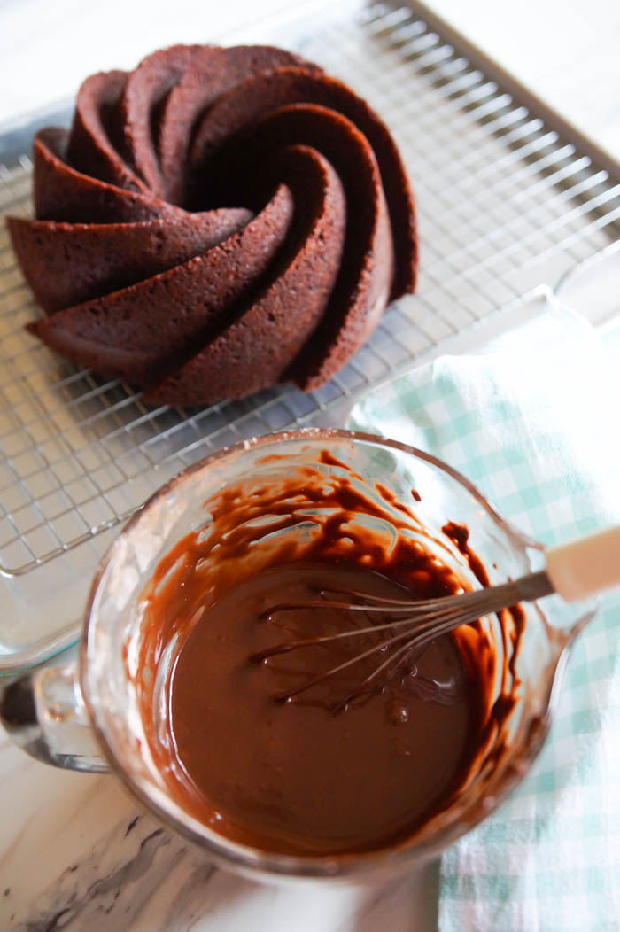 Cocoa Bundt Cake with shiny chocolate glaze from bakeat350.net